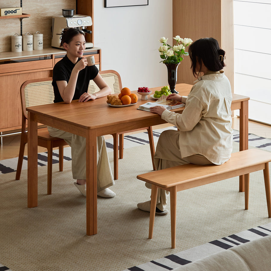 Scandinavian cherry wood dining table eclipse primary product view.