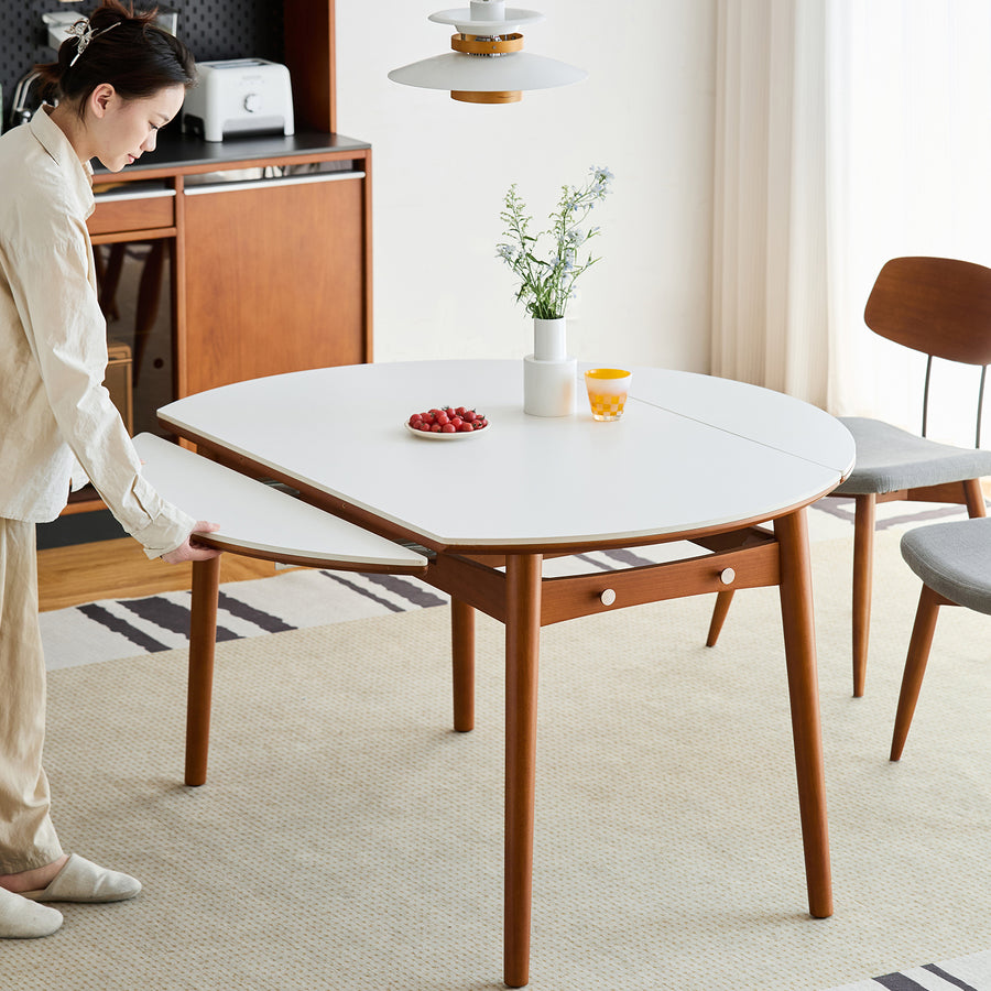 Vintage sintered stone extendable dining table minima size charts.