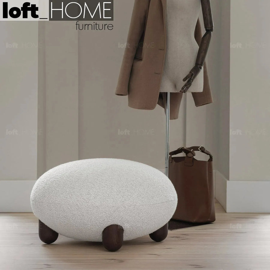 Cream fabric ottoman teddy primary product view.
