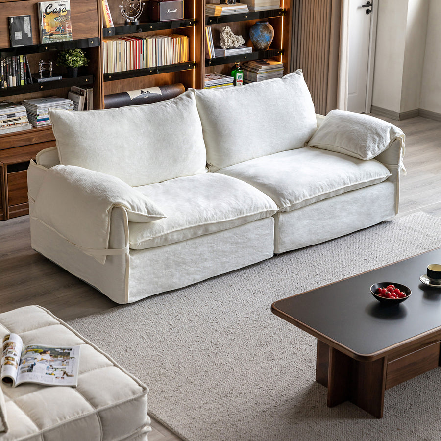 Cream cotton fabric 2 seater sofa folding ear primary product view.