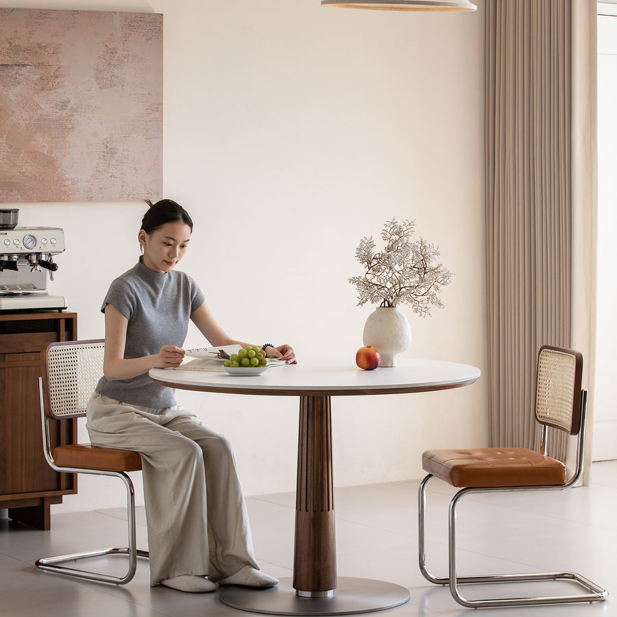 Japandi walnut wood sintered stone round dining table grey primary product view.