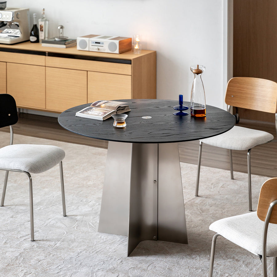 Minimalist ash wood veneer stainless steel round dining table black aeri primary product view.