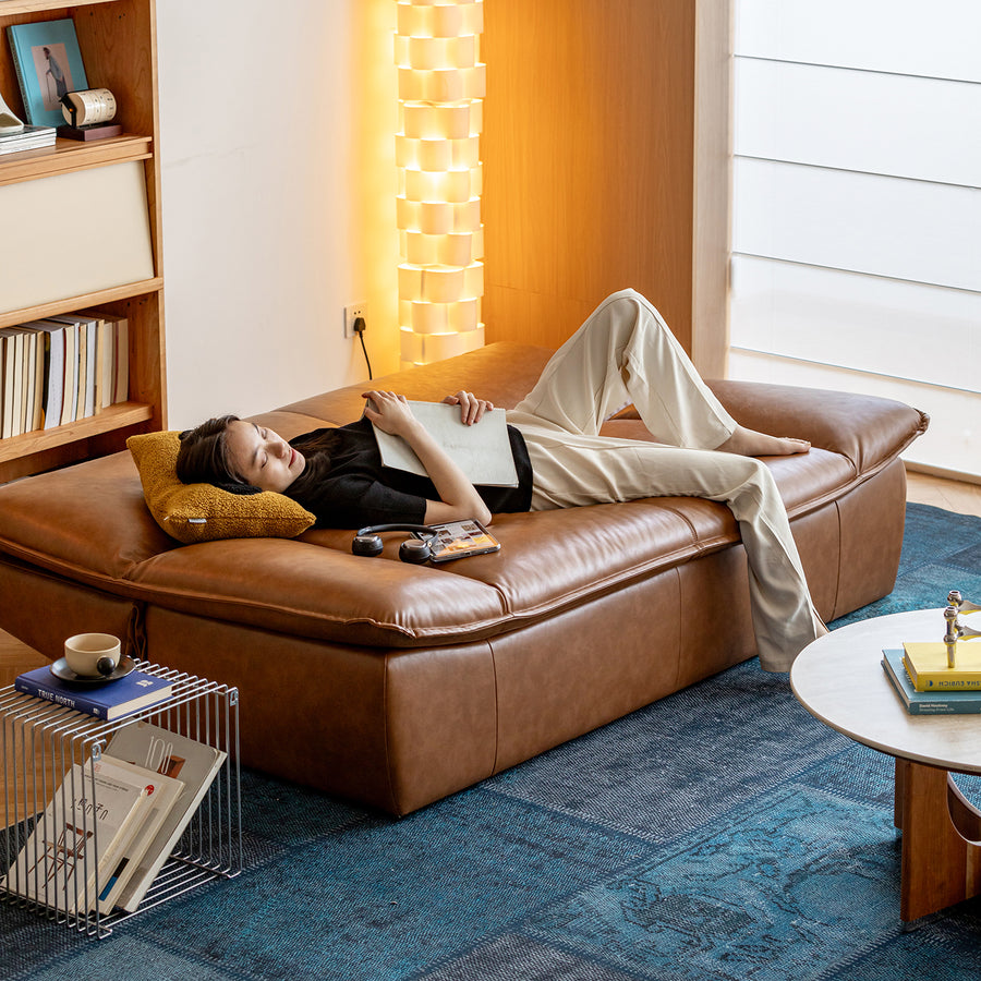 Modern microfiber leather 2 seater sofa bed sailboat in still life.