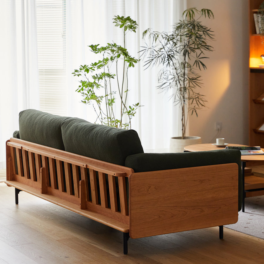 Scandinavian boucle fabric 4 seater sofa harvest in close up details.