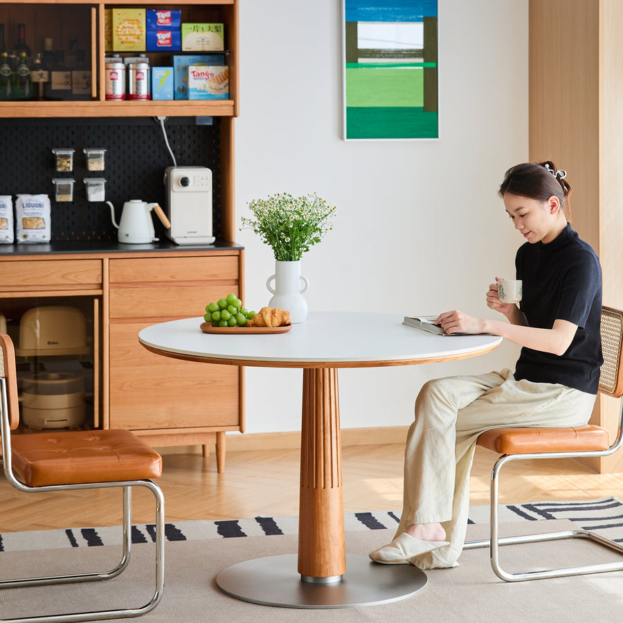 Scandinavian cherry wood sintered stone round dining table grey primary product view.