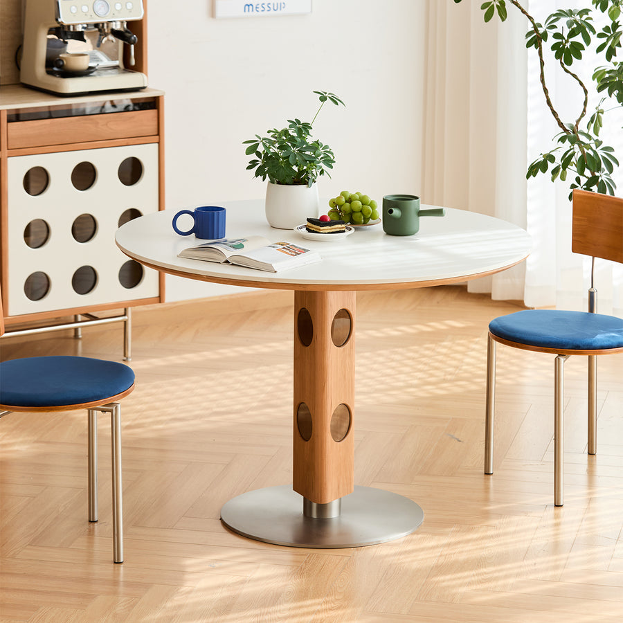 Scandinavian cherry wood sintered stone round dining table timeless primary product view.