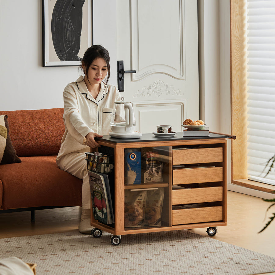 Scandinavian cherry wood wheeled trolley side table bus in real life style.