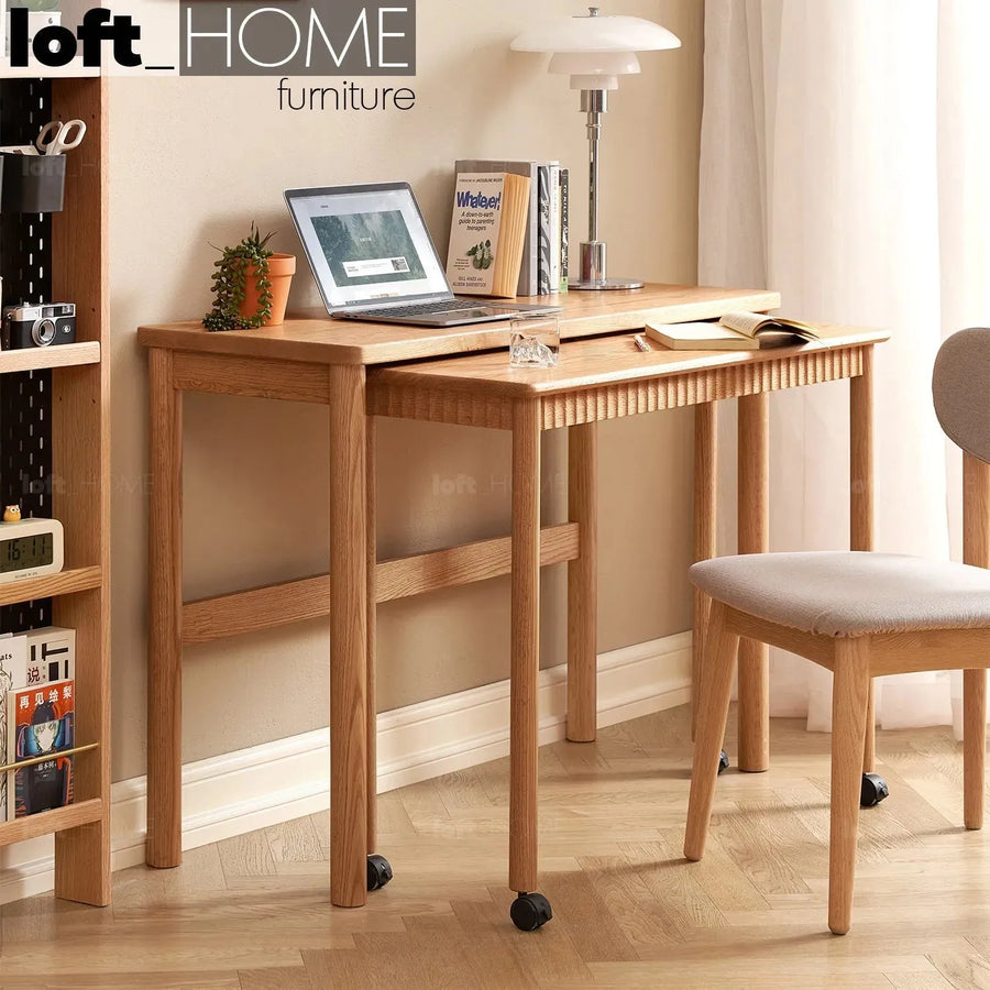 Scandinavian wood caster wheel extendable study table twin layer primary product view.
