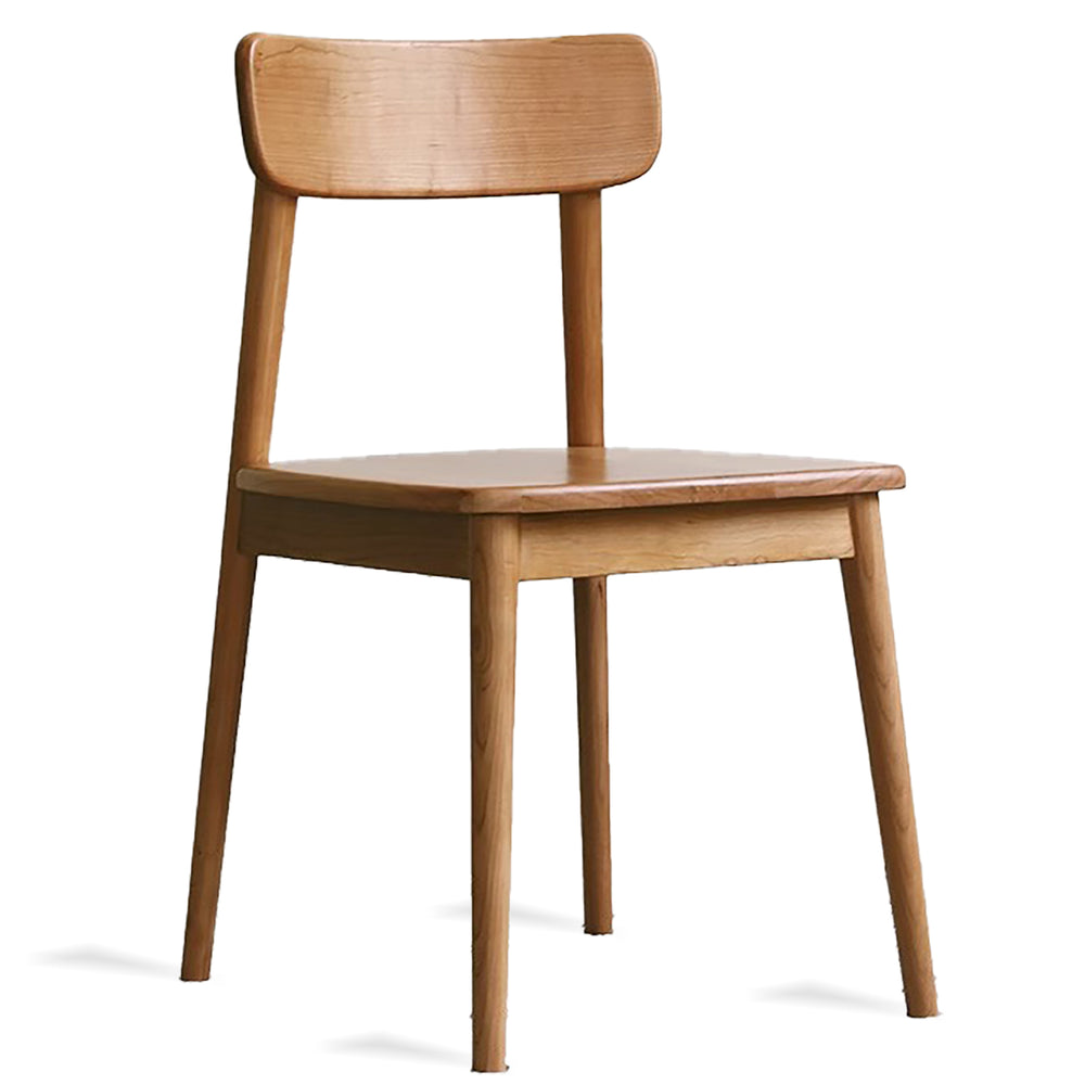 Scandinavian cherry wood dining chair green in white background.