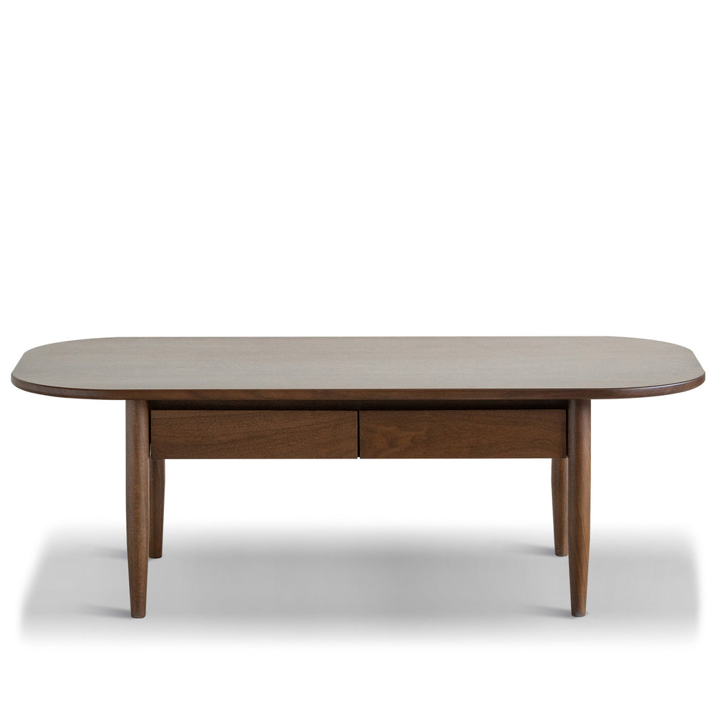 Vintage walnut wood coffee table vista in white background.